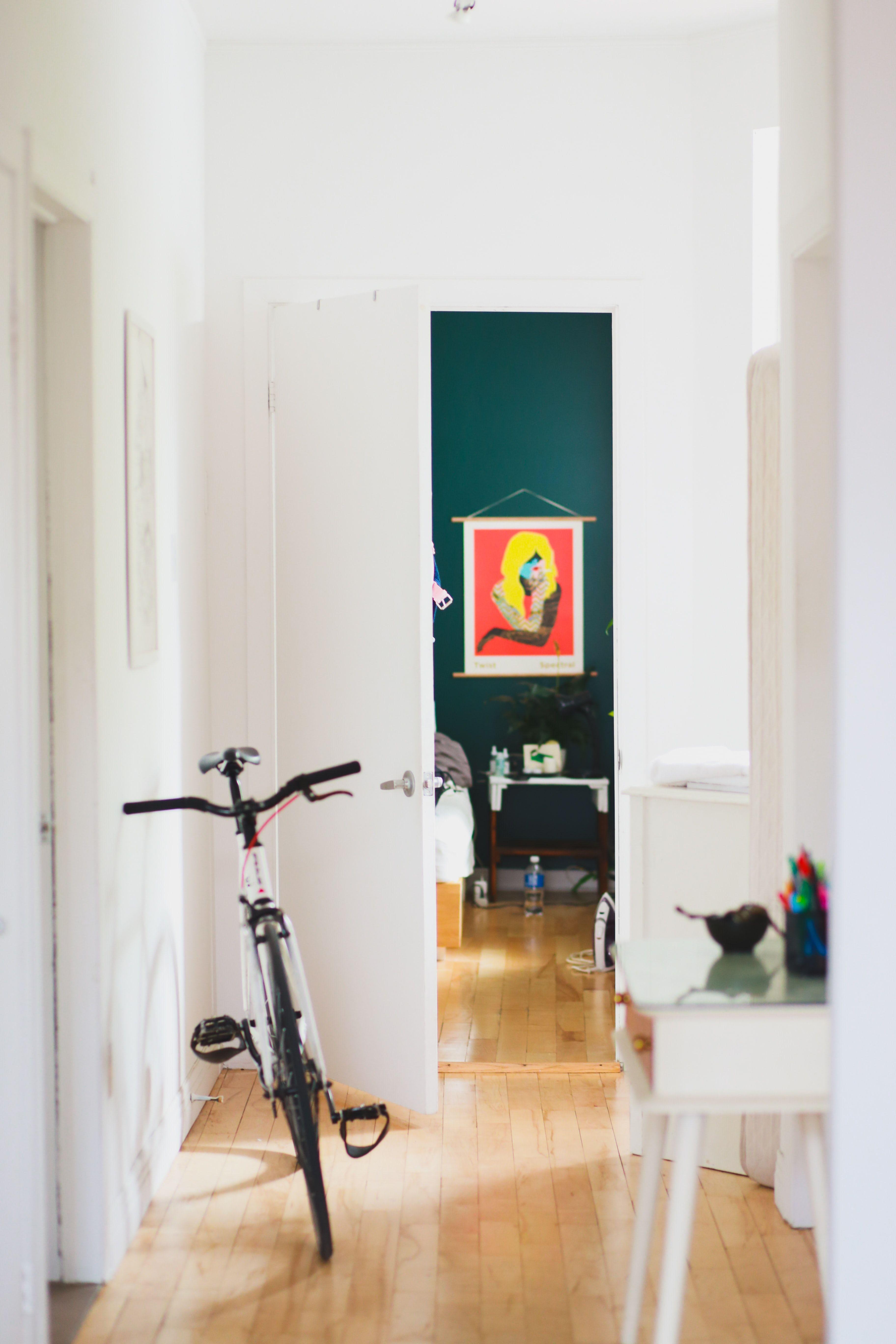 HHQtTrosQtM-unsplash-home bike in hallway.jpg